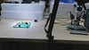 Z180X-XVH2003 digital microscope displaying PCB inspection on external monitor via VGA output